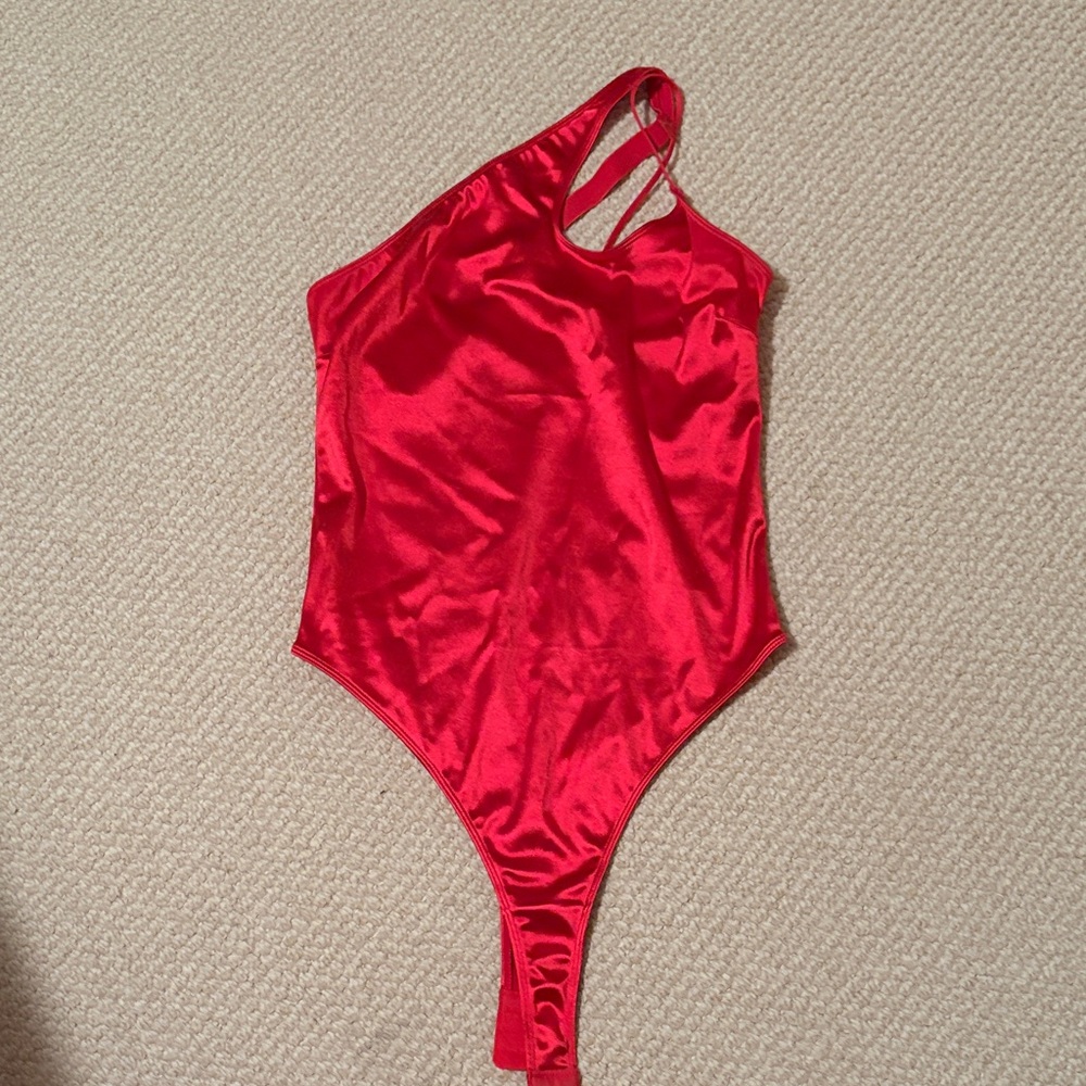 One shoulder red bodysuit